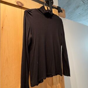 Classic Black Philosophy Turtleneck Top